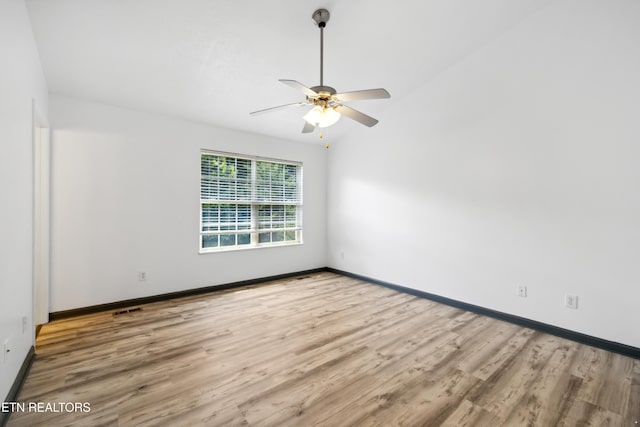 6108 Burlwood Rd, Knoxville, TN 37921 - spare room featuring ceiling fan, wood finished floors, and baseboards