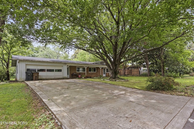 205 Newcastle Rd, Knoxville, TN 37909 - ranch-style house with an attached garage and concrete driveway