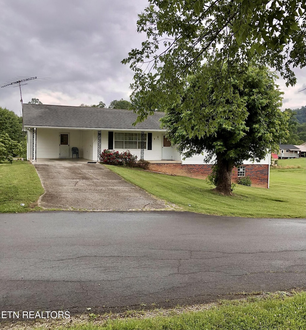 312 Terrace View Dr, Bean Station, TN 37708 - ranch-style home with asphalt driveway, a front lawn, and a carport