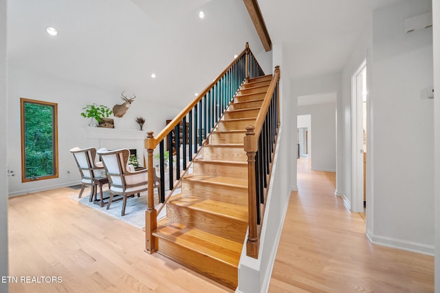 1907 Oakwood Rd, Walland, TN 37886 - stairway with wood finished floors, healthy amount of natural light, baseboards, recessed lighting, and beam ceiling