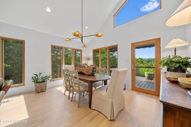 1907 Oakwood Rd, Walland, TN 37886 - dining space with light wood-style floors, high vaulted ceiling, and recessed lighting