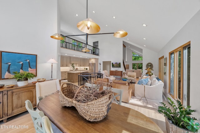 1907 Oakwood Rd, Walland, TN 37886 - living area featuring high vaulted ceiling, light wood-type flooring, and recessed lighting