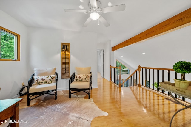 1907 Oakwood Rd, Walland, TN 37886 - living area with plenty of natural light, a ceiling fan, an upstairs landing, wood finished floors, and beamed ceiling