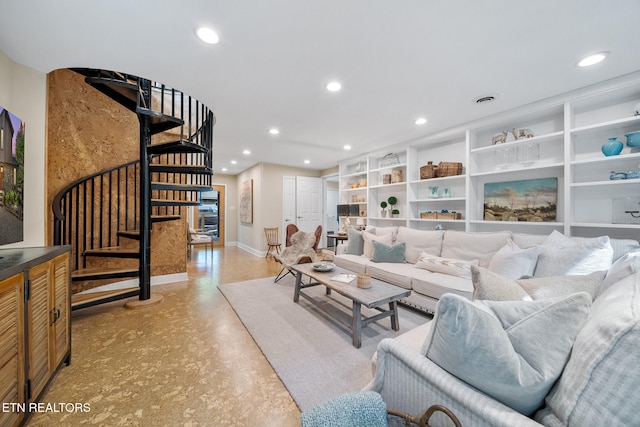 1907 Oakwood Rd, Walland, TN 37886 - living area featuring stairs, baseboards, recessed lighting, and concrete floors