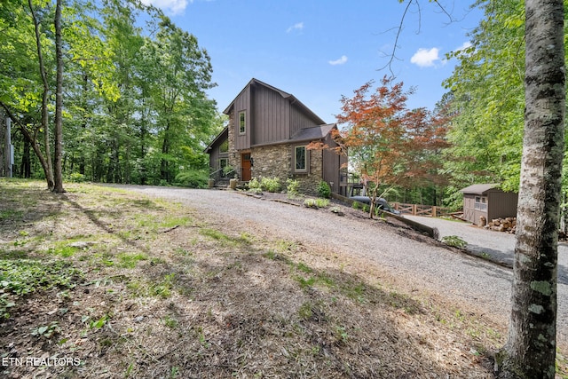 1907 Oakwood Rd, Walland, TN 37886 - back of house featuring an outbuilding and gravel driveway