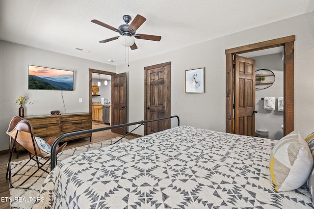 2046 Slippery Rock Cir, Sevierville, TN 37862 - bedroom with wood finished floors, a ceiling fan, and baseboards
