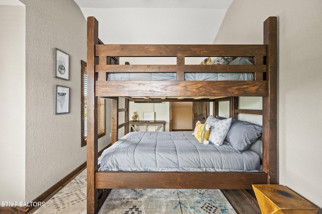 2046 Slippery Rock Cir, Sevierville, TN 37862 - bedroom featuring wood finished floors and a textured wall