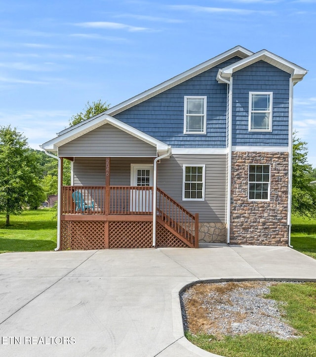 2046 Slippery Rock Cir, Sevierville, TN 37862 - view of front of house with stone siding and covered porch
