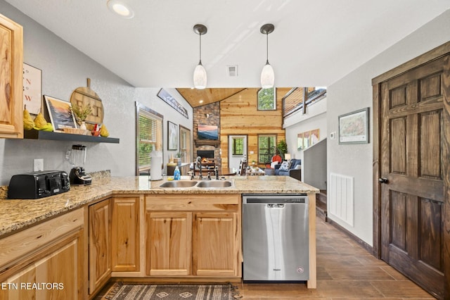 2046 Slippery Rock Cir, Sevierville, TN 37862 - kitchen with stainless steel dishwasher, a peninsula, open floor plan, lofted ceiling, and a sink