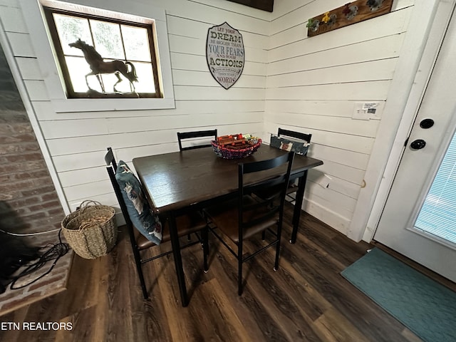 576 Mill Creek Rd, Pigeon Forge, TN 37863 - dining area featuring dark wood-style flooring and wooden walls
