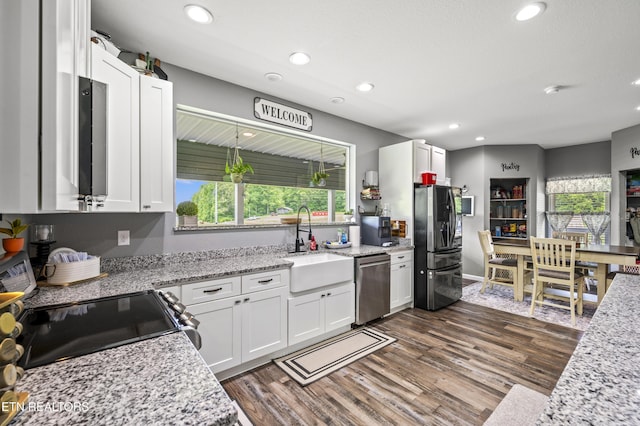 1947 Oneil Rd, Newport, TN 37821 - kitchen with appliances with stainless steel finishes, a sink, recessed lighting, and white cabinetry