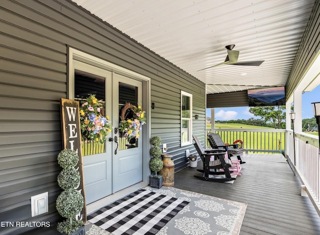 1947 Oneil Rd, Newport, TN 37821 - wooden porch with french doors and a ceiling fan