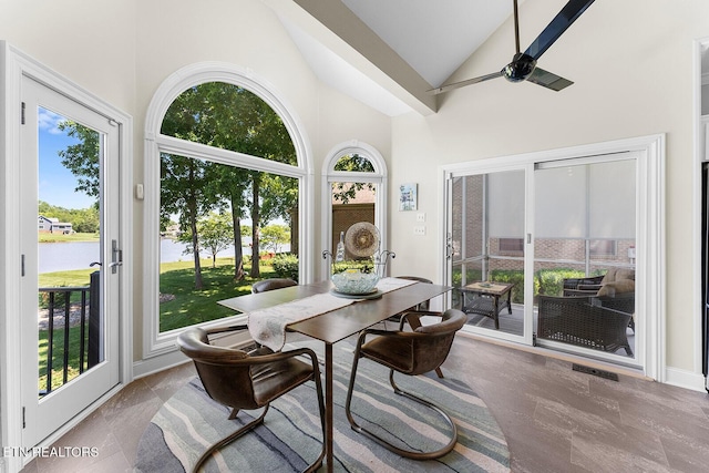 105 Gogeyi Trl, Vonore, TN 37885 - sunroom featuring a water view, high vaulted ceiling, and marble finish flooring