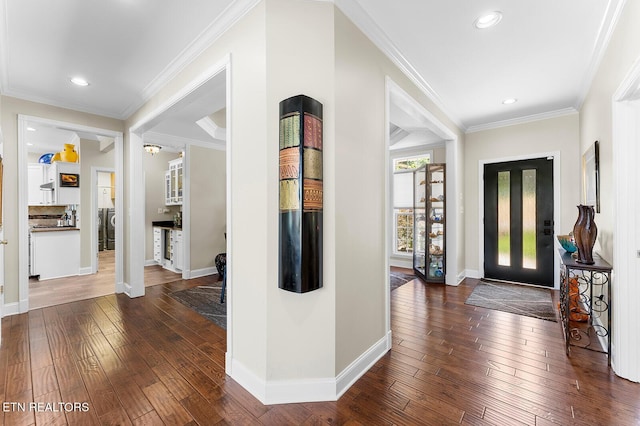 105 Gogeyi Trl, Vonore, TN 37885 - entrance foyer with dark wood-type flooring, separate washer and dryer, baseboards, ornamental molding, and recessed lighting