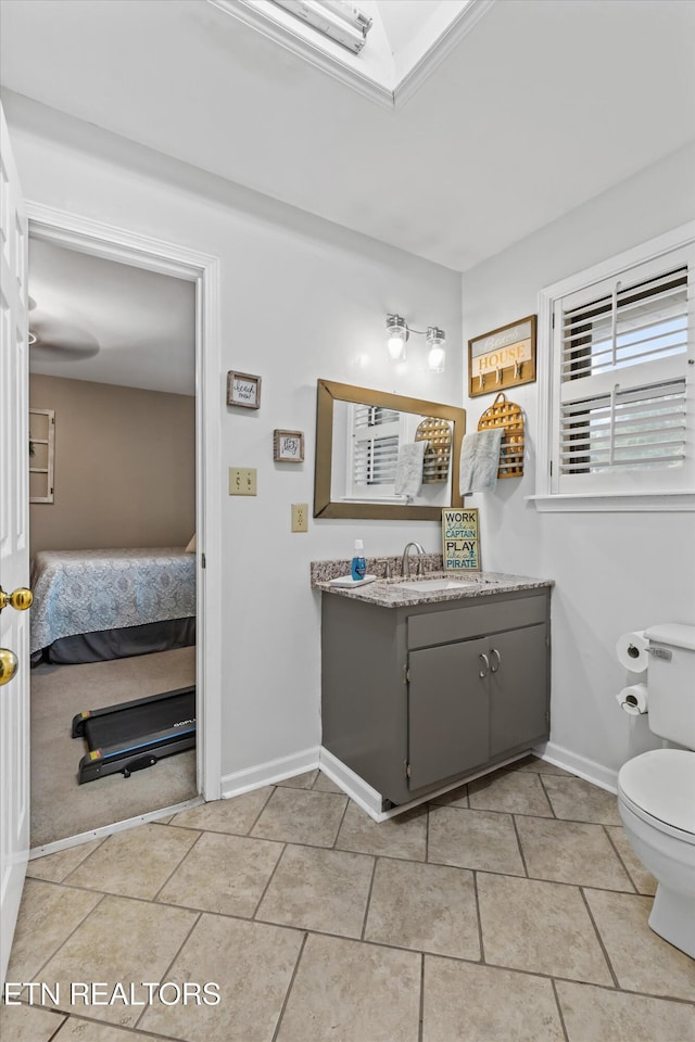 1420 Brentwood Dr, Athens, TN 37303 - bathroom featuring vanity, toilet, ensuite bath, and baseboards
