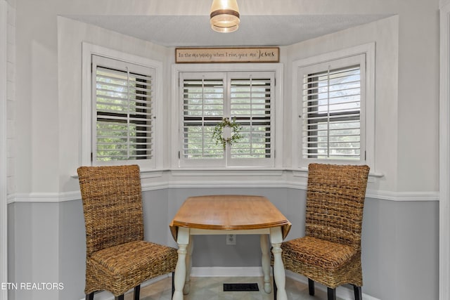 1420 Brentwood Dr, Athens, TN 37303 - living area with healthy amount of natural light, a textured ceiling, and baseboards