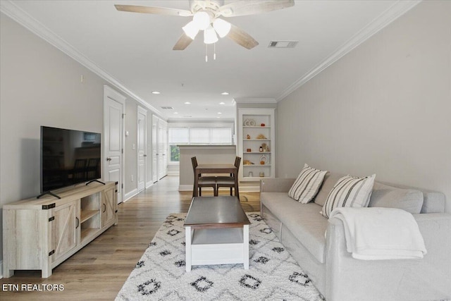 3950 Cherokee Woods Way Unit 204, Knoxville, TN 37920 - living area with crown molding, light wood-style flooring, a ceiling fan, and recessed lighting