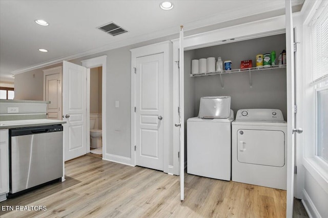 3950 Cherokee Woods Way Unit 204, Knoxville, TN 37920 - washroom with crown molding, independent washer and dryer, recessed lighting, and light wood finished floors