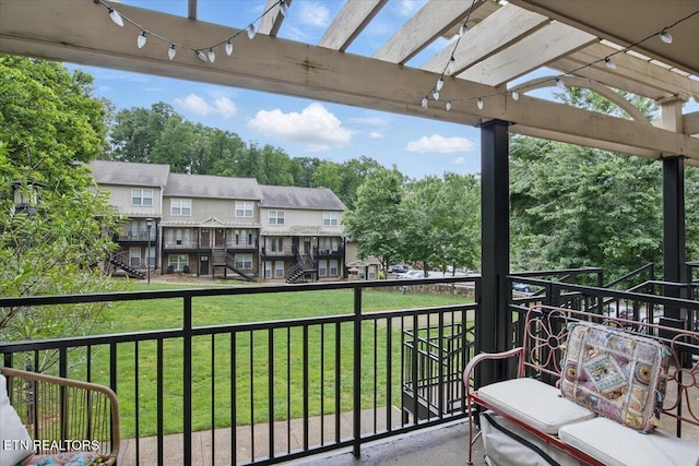 3950 Cherokee Woods Way Unit 204, Knoxville, TN 37920 - balcony featuring a pergola, a residential view, and view of wooded area