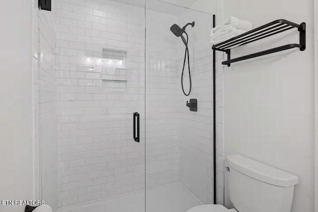 525 S Carter School Rd, Strawberry Plains, TN 37871 - bathroom featuring toilet and a shower stall