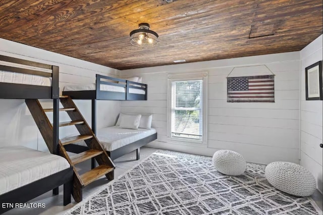 525 S Carter School Rd, Strawberry Plains, TN 37871 - bedroom featuring wooden ceiling and wooden walls