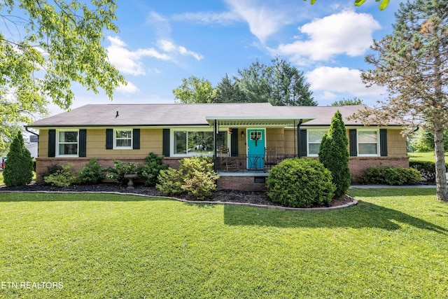 2116 Pleasant View Rd, Knoxville, TN 37914 - single story home featuring brick siding, a front yard, and covered porch
