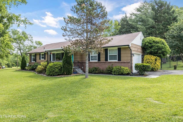 2116 Pleasant View Rd, Knoxville, TN 37914 - ranch-style home with brick siding, a front yard, a garage, and a shingled roof