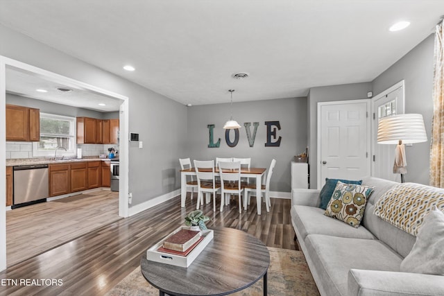 2116 Pleasant View Rd, Knoxville, TN 37914 - living area featuring light wood-type flooring, baseboards, and recessed lighting