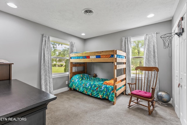 2116 Pleasant View Rd, Knoxville, TN 37914 - bedroom featuring carpet floors, a textured ceiling, recessed lighting, and baseboards