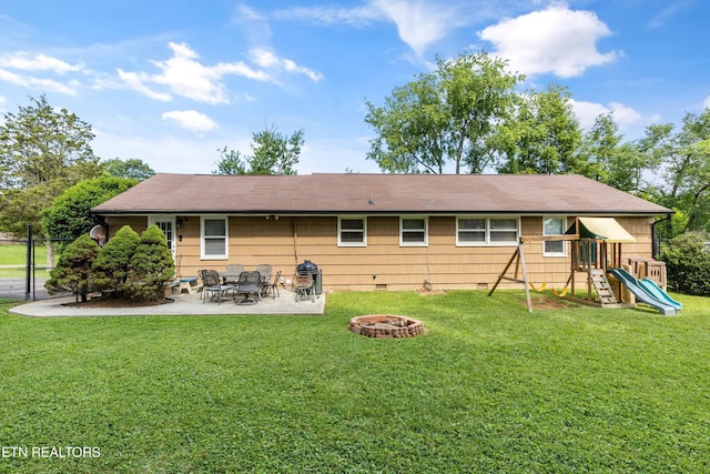 2116 Pleasant View Rd, Knoxville, TN 37914 - back of house with a fire pit, a patio, a playground, crawl space, and a shingled roof