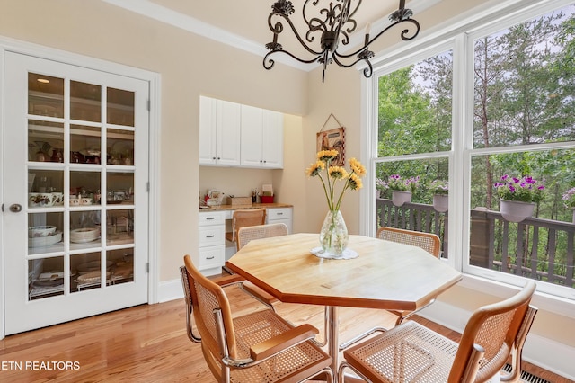 670 Hawk View Dr, Townsend, TN 37882 - dining room featuring a chandelier and light wood-type flooring