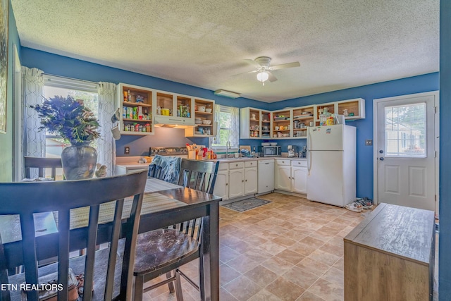 159 Little Creek Ln, Lafollette, TN 37766 - kitchen with white appliances, open shelves, white cabinetry, plenty of natural light, and a textured ceiling