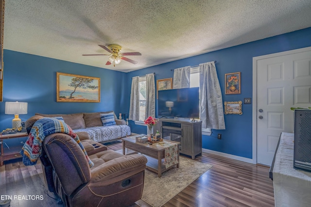 159 Little Creek Ln, Lafollette, TN 37766 - living area featuring a ceiling fan, baseboards, wood finished floors, and a textured ceiling