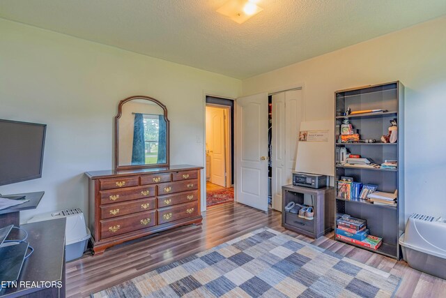 159 Little Creek Ln, Lafollette, TN 37766 - bedroom featuring wood finished floors and a closet