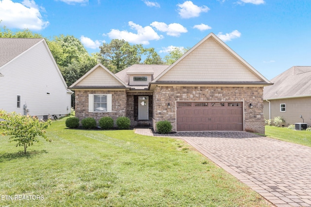 115 Tsuhdatsi Way, Loudon, TN 37774 - view of front of property with a garage, a front lawn, driveway, and central AC