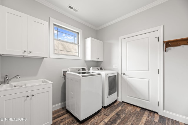 115 Tsuhdatsi Way, Loudon, TN 37774 - laundry area with cabinet space, washing machine and clothes dryer, crown molding, dark wood finished floors, and baseboards