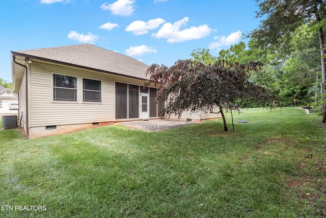 115 Tsuhdatsi Way, Loudon, TN 37774 - back of house featuring a lawn, central AC, crawl space, a sunroom, and a patio