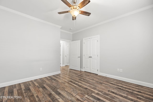 115 Tsuhdatsi Way, Loudon, TN 37774 - unfurnished bedroom featuring ornamental molding, dark wood finished floors, baseboards, ceiling fan, and a closet