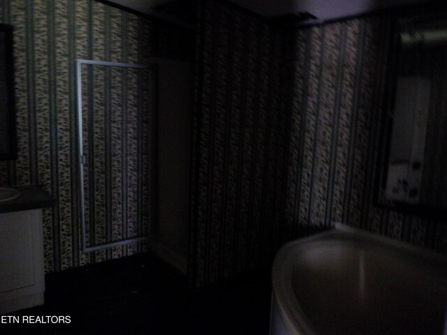 418 N Norris St, Jamestown, TN 38556 - bathroom featuring wallpapered walls and vanity