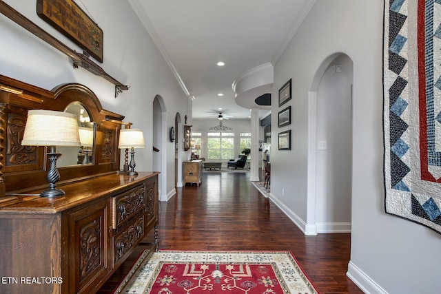 220 Tommotley Dr, Loudon, TN 37774 - hallway with arched walkways, wood finished floors, baseboards, crown molding, and recessed lighting