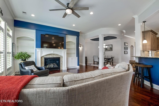 220 Tommotley Dr, Loudon, TN 37774 - living area with ceiling fan, dark wood-type flooring, ornamental molding, baseboards, and a high end fireplace