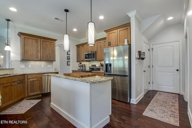 220 Tommotley Dr, Loudon, TN 37774 - kitchen featuring stainless steel appliances, brown cabinetry, backsplash, dark wood-style flooring, and recessed lighting