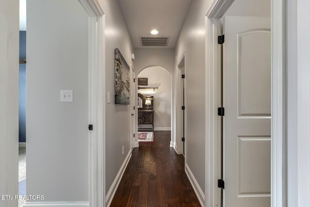 220 Tommotley Dr, Loudon, TN 37774 - hall with arched walkways, dark wood-style flooring, and baseboards