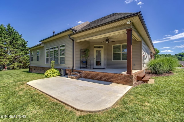 220 Tommotley Dr, Loudon, TN 37774 - entrance to property with a ceiling fan, a yard, and covered porch