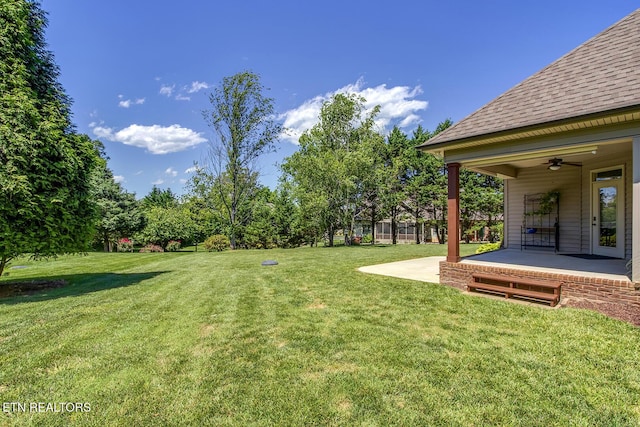 220 Tommotley Dr, Loudon, TN 37774 - view of grassy yard with a ceiling fan and a patio
