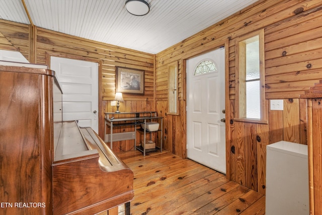 2009 Tellico Reliance Rd, Reliance, TN 37369 - foyer entrance with wood-type flooring and wooden walls