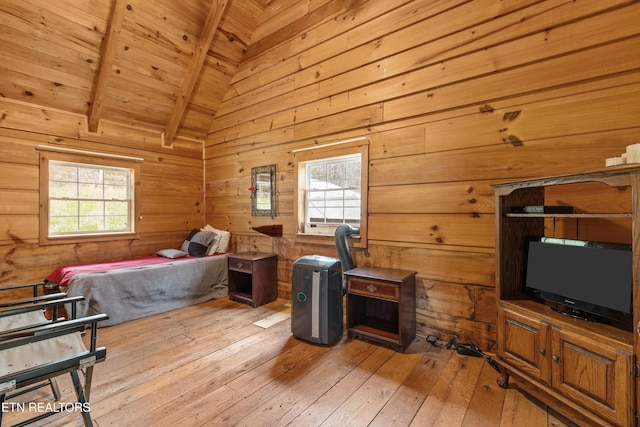 2009 Tellico Reliance Rd, Reliance, TN 37369 - bedroom featuring light wood-type flooring, wooden walls, and wood ceiling