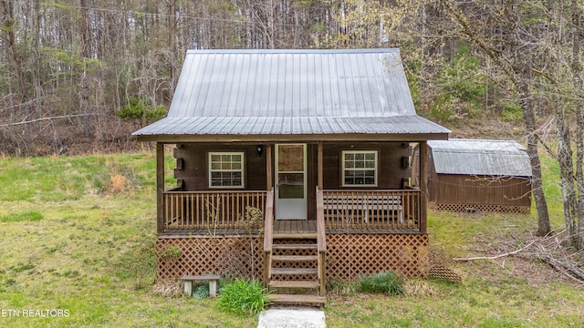 2009 Tellico Reliance Rd, Reliance, TN 37369 - view of outdoor structure with a porch and a forest view