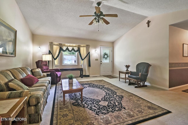 2162 Spruce Loop, Crossville, TN 38555 - living area with a textured ceiling, carpet, vaulted ceiling, ceiling fan, and baseboards