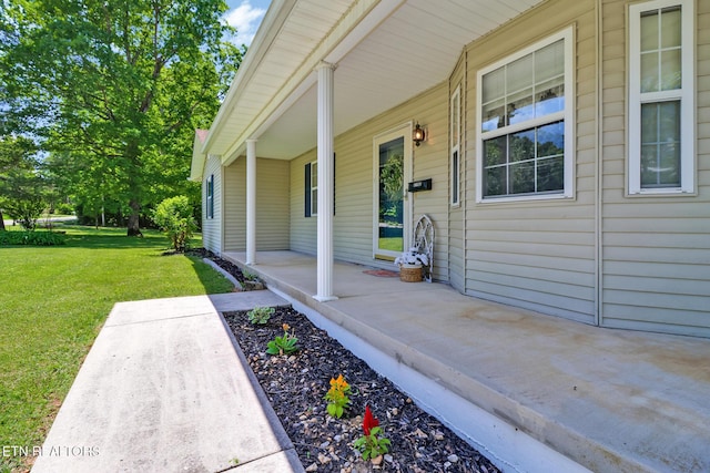 2162 Spruce Loop, Crossville, TN 38555 - entrance to property featuring a porch and a yard